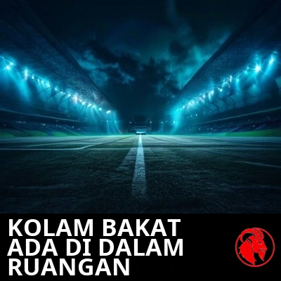 Stadion kosong yang disinari lampu di malam hari, dengan satu ponsel bersinar di tengah lapangan. Keterangan: Lumbung bakat kini di dalam ruangan.